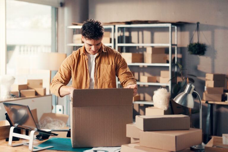 man packing office